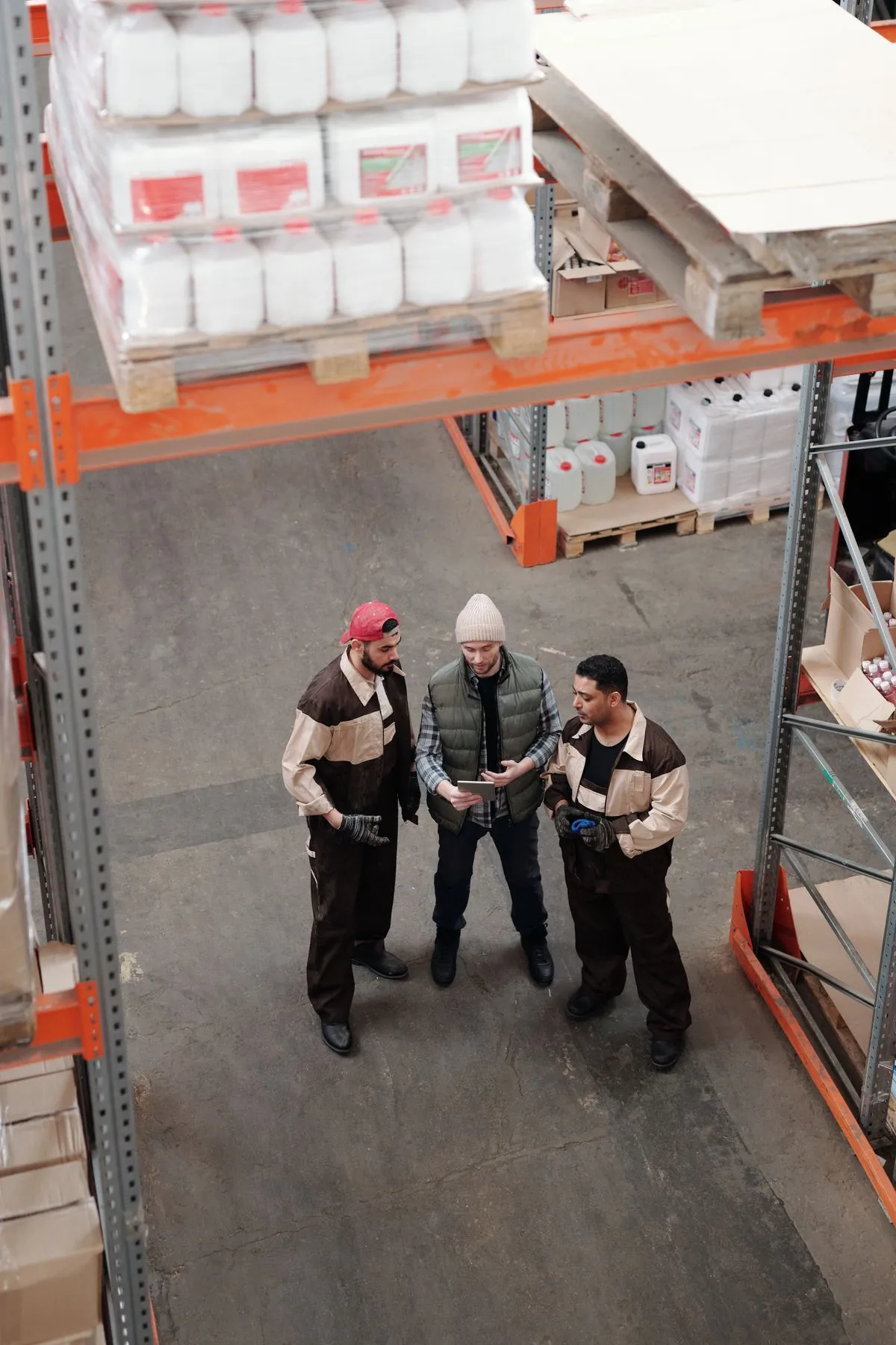 Warehouse team reviewing a shipment